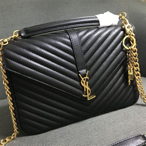 Saint Laurent: Designer Handbags YSL .